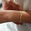 imageDainty Gold Bracelets for Women 14K Gold Filled Adjustable Layered Bracelet Cute Evil Eye Oval Chain Pearl Bar Turtle Gold Bracelets for Women JewelryDove Pearls