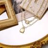 imageTurandoss Dainty Gold Choker Necklaces for Women  14K Gold Plated Handmade Medallion Snake Link Chain Cross Star Moon Adjustable Simple Choker Necklaces for Women JewelryToggle ClaspLock