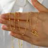 imageTurandoss Gold Chain Necklace for Women Trendy  Dainty 14K Real Gold Plated Cuban Necklace Snake Necklace Disc Chain Necklace Gold Multi Layered Paperclip Chain Necklace Gold Jewelry Gifts for WomenLayered BeadToggle Closure Chain