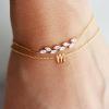 imageTurandoss Gold Initial Bracelet for Women  14K Gold Plated Charm M Initial Layered Bracelets for Women Trendy Dainty Personalized Gold CZ Leaf Charm Bracelets for Women Gifts