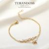 imageTurandoss Gold Initial Bracelet for Women  14K Gold Plated Charm M Initial Layered Bracelets for Women Trendy Dainty Personalized Gold CZ Leaf Charm Bracelets for Women Gifts