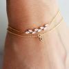 imageTurandoss Gold Initial Bracelets for Women  14K Gold Plated Charm Initial Layered Bracelets for Women Gold CZ Leaf Bracelets for Women Bridesmaid Proposal Gifts bride giftsQ